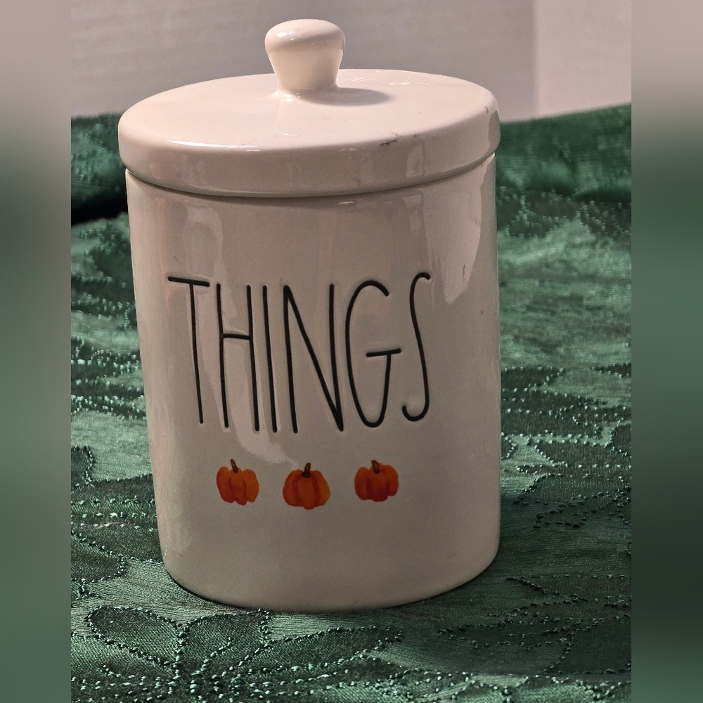 Rae Dunn Cream Jar with‎ Orange Pumpkin Accents with 'THINGS' text.